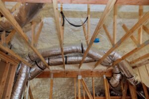 Insulation of attic with fiberglass cold barrier and insulation material insulation attic heating