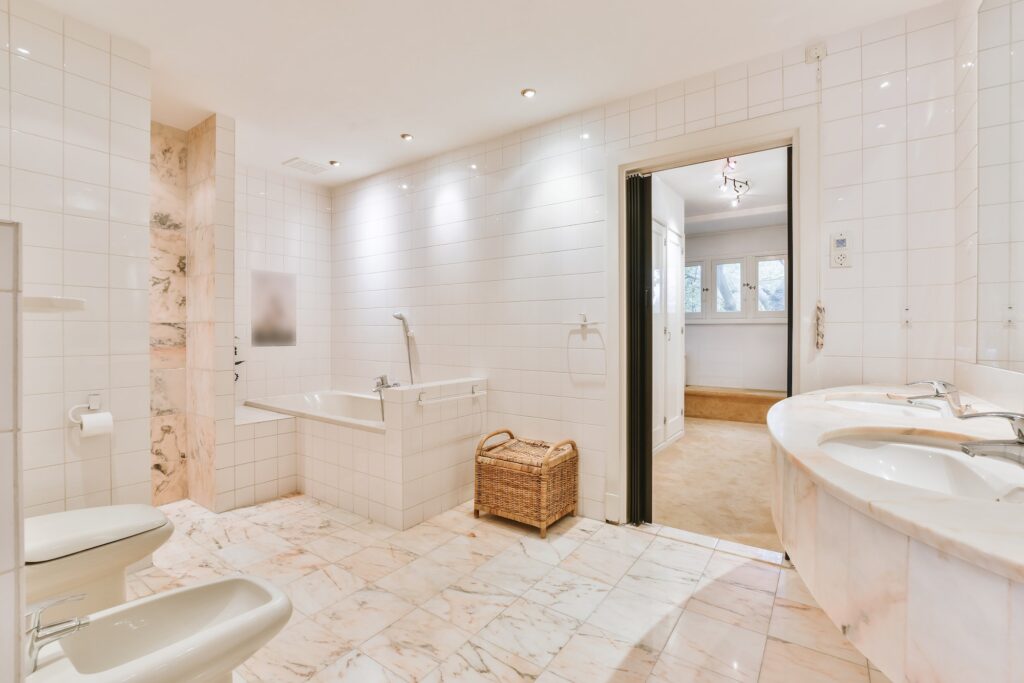 Light bathroom with marble tiles