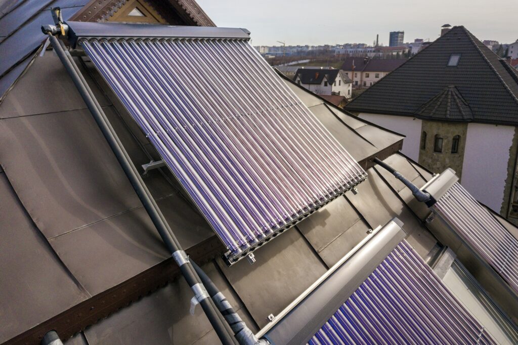 Solar water heating system on house roof.