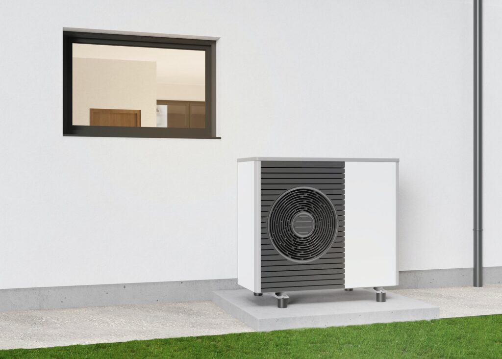 Air heat pump standing outdoors. Modern, environmentally friendly heating.