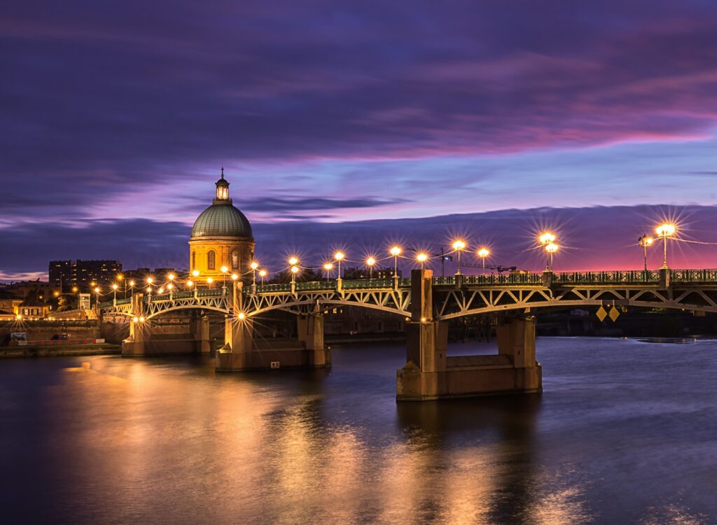 Saint Pierre bridge and Saint Joseph Chapel at sunset. Toulouse, France