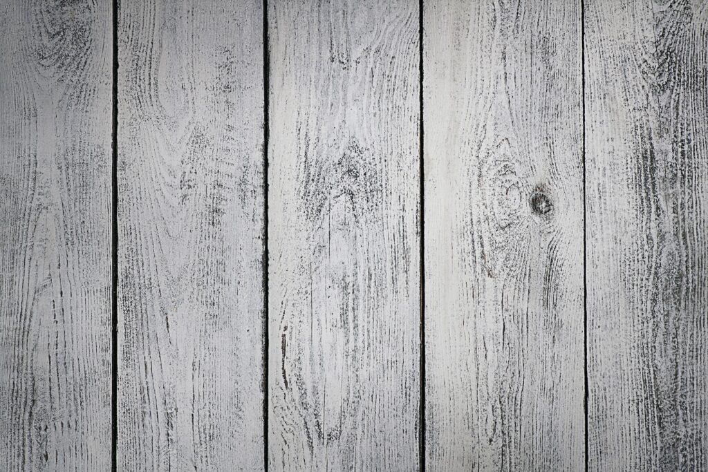 white-painted wooden panel abstract table background.